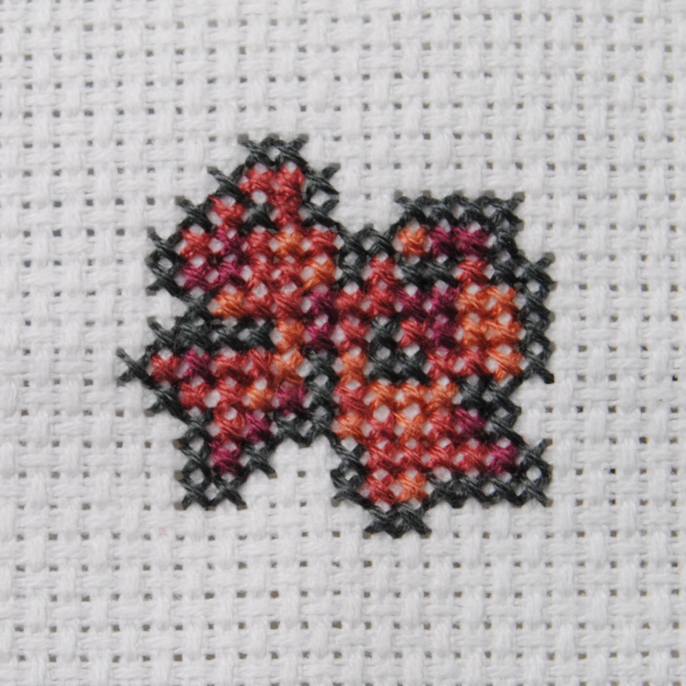 A finished cross stitch project.