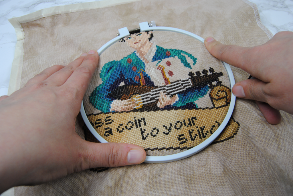 Demonstrating how to use an embroidery hoop
