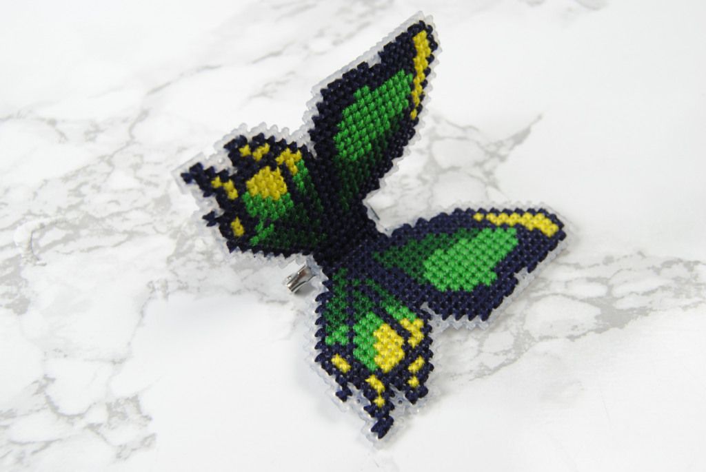 Just an overview shot of a cross stitched butterfly pin.