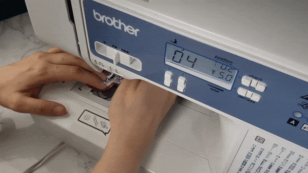 Gif of sewing a border with a sewing machine
