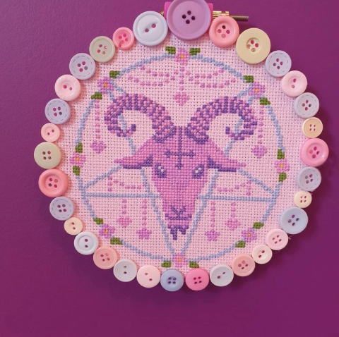 An embroidery hoop decorated with buttons, created by crafty_avocado