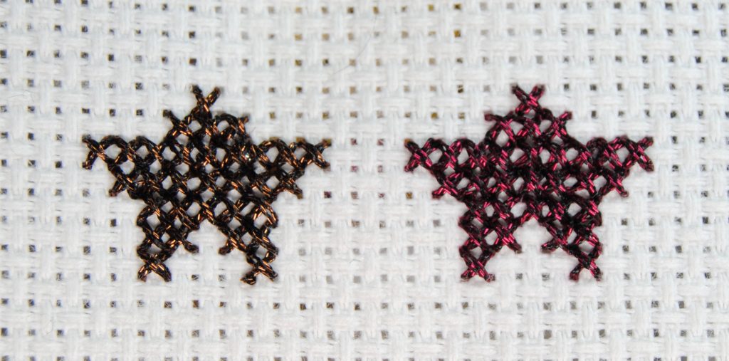 Comparison stitch. Two metallic stars showing the difference between normal stitching and this technique