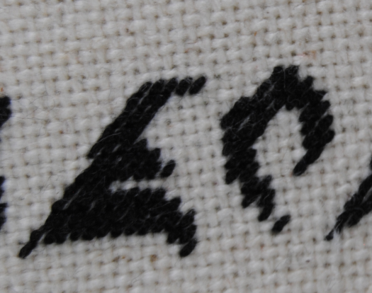 Close up of the ornament showing half stitches instead of cross stitches.