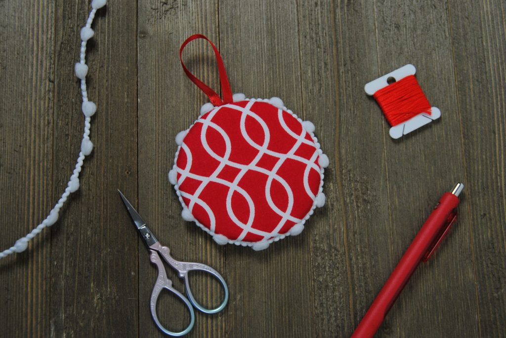 The back side of a cross sttich flat ornament.