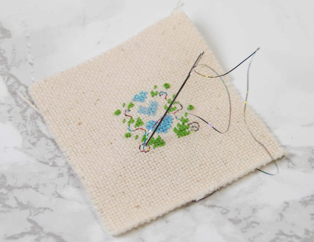 Demonstration of backstitch done in Sulky Holoshimmer.