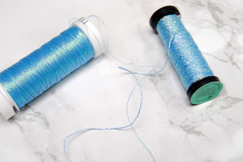 Comparison between spools of Sulky Metallics and Kreinik Braid #4