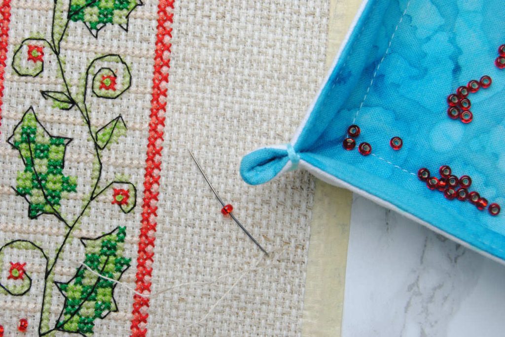A fabric tray being used to hold seed beads while you work.