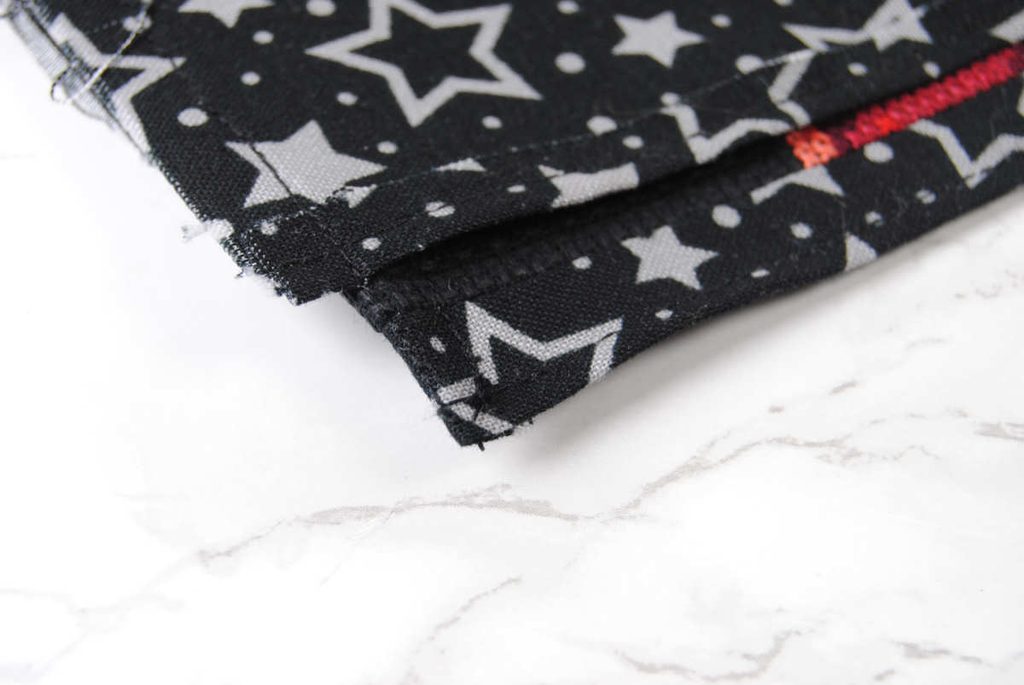 Closeup of the corner edge of a fabric switch dock cover.