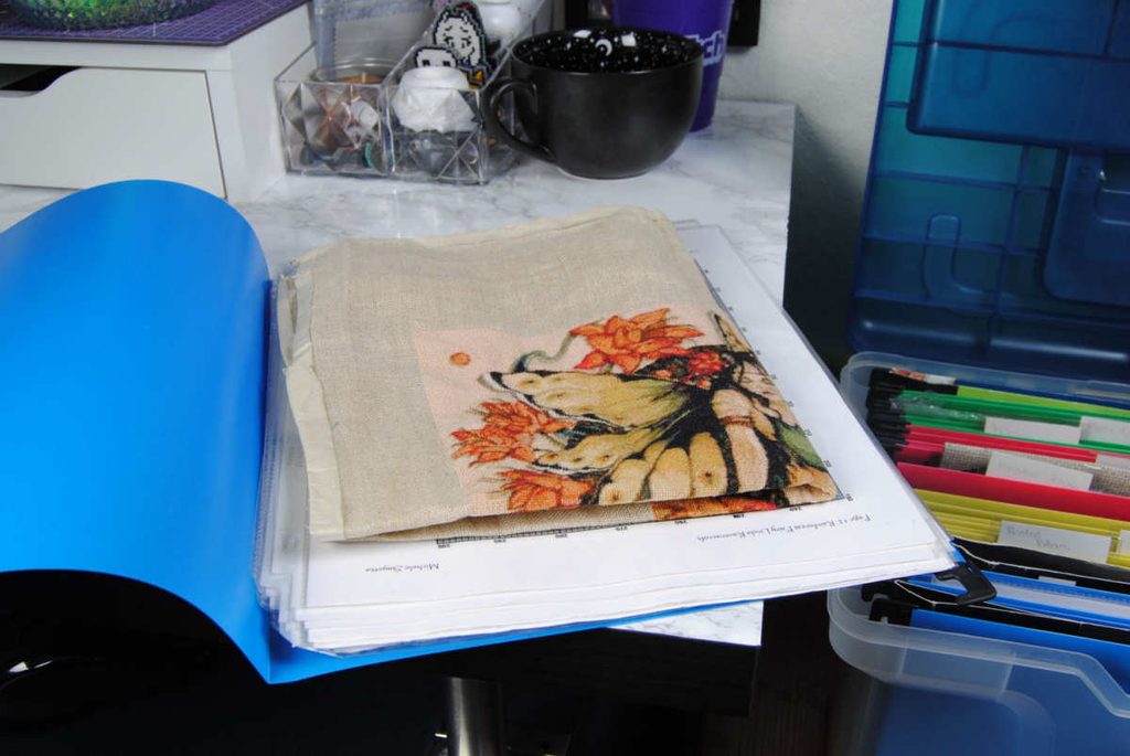 An in progress HAED fairy pattern stored in a hanging file folder.