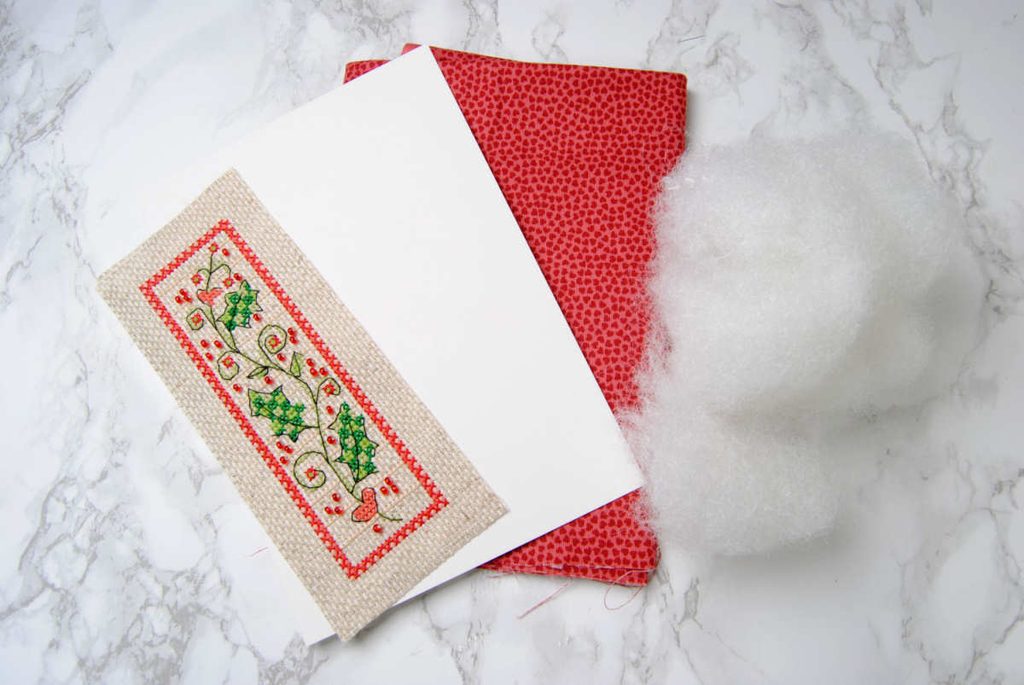 Materials needed to make a cross stitch pin drum.