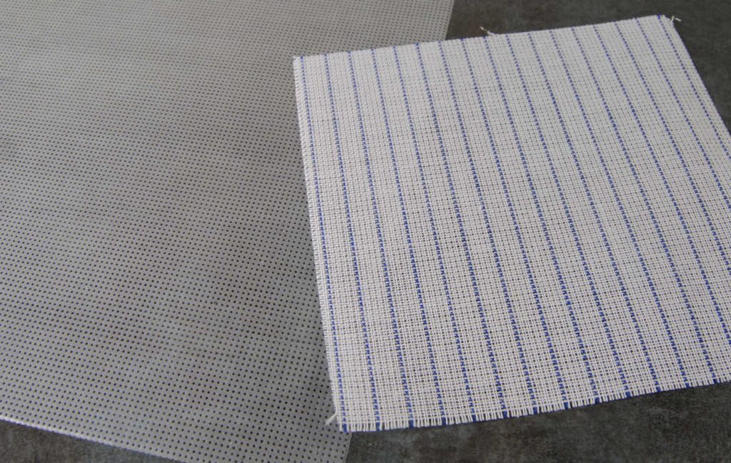waste canvas and soluble canvas side by side for comparison.