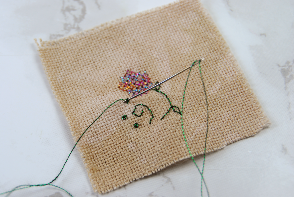 A french knot being made with Bijoux threads.