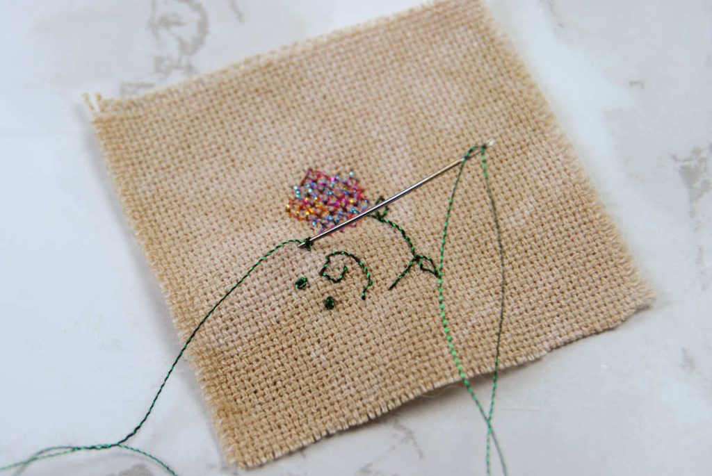 A french knot being made with Bijoux threads.
