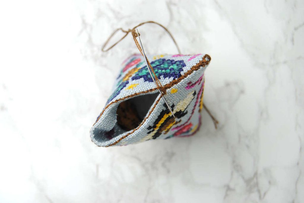 Continue sewing the backstitch together closing the end of your humbug.