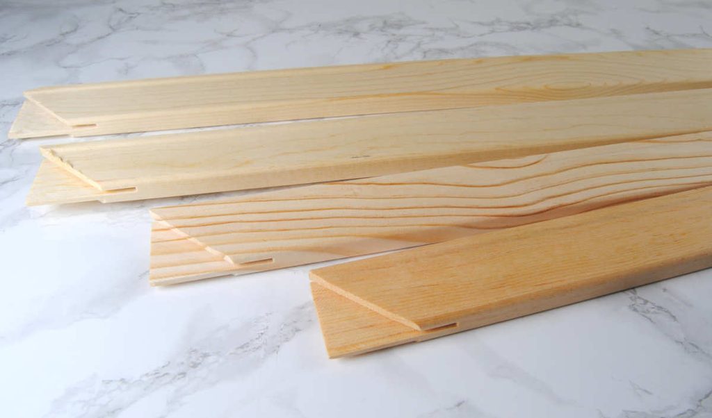 Two pairs of stretcher bars in different sizes determining the size of you finished stretched canvas.
