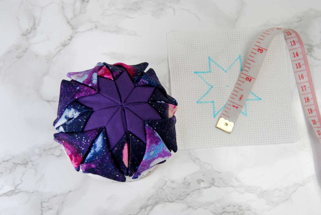 Mockup quilted ornament for sizing cross stitch pattern.