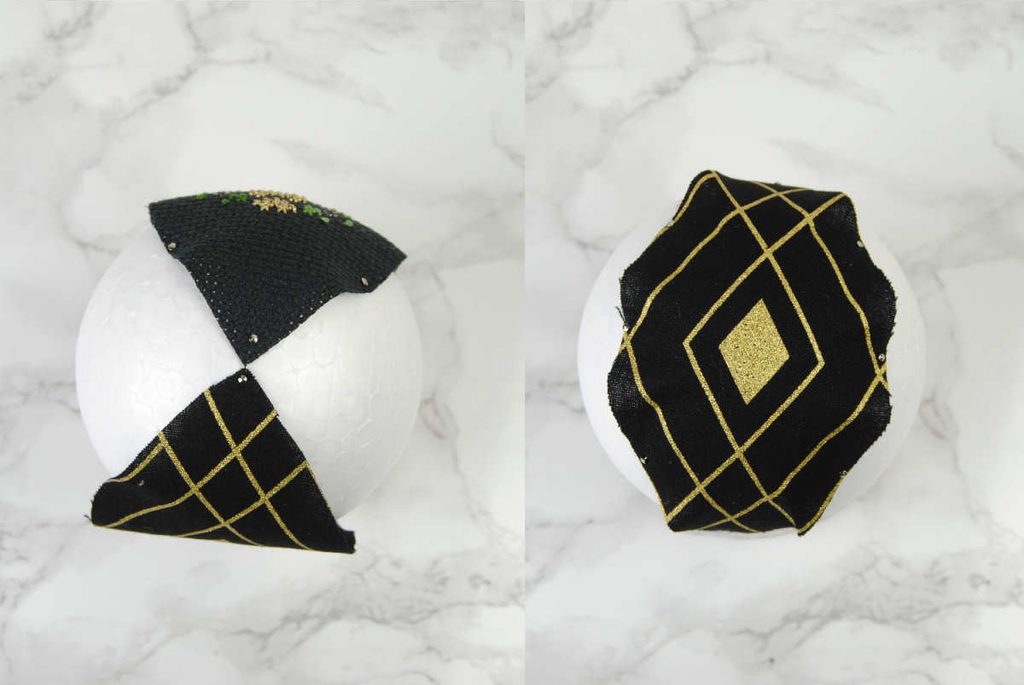 Demonstrating pinning the second lens into the styrofoam ball