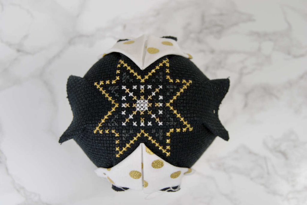 Start with opposing sides before layering fabric on the diagonals.