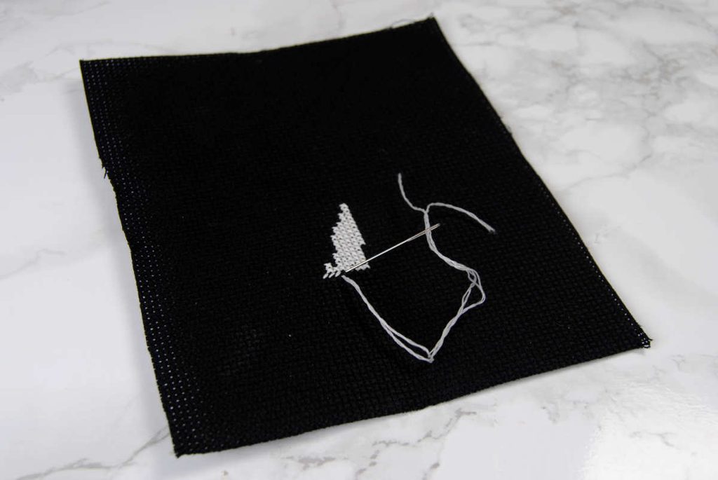 Demonstration of stitching with DMC glow in the dark thread. 