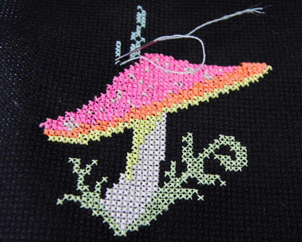 Demonstration of stitching with blue kreinik #4 glow in the dark thread. 