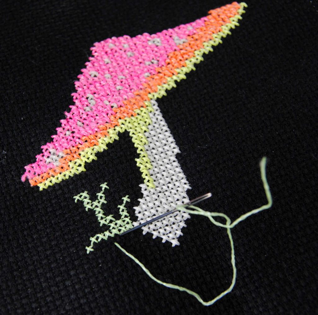 Demonstration of stitching with green kreinik #4 glow in the dark thread. 