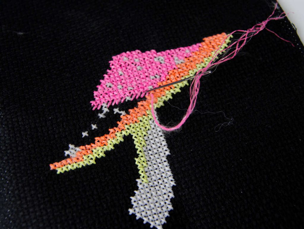 Demonstration of stitching with pink kreinik #8 glow in the dark thread. 