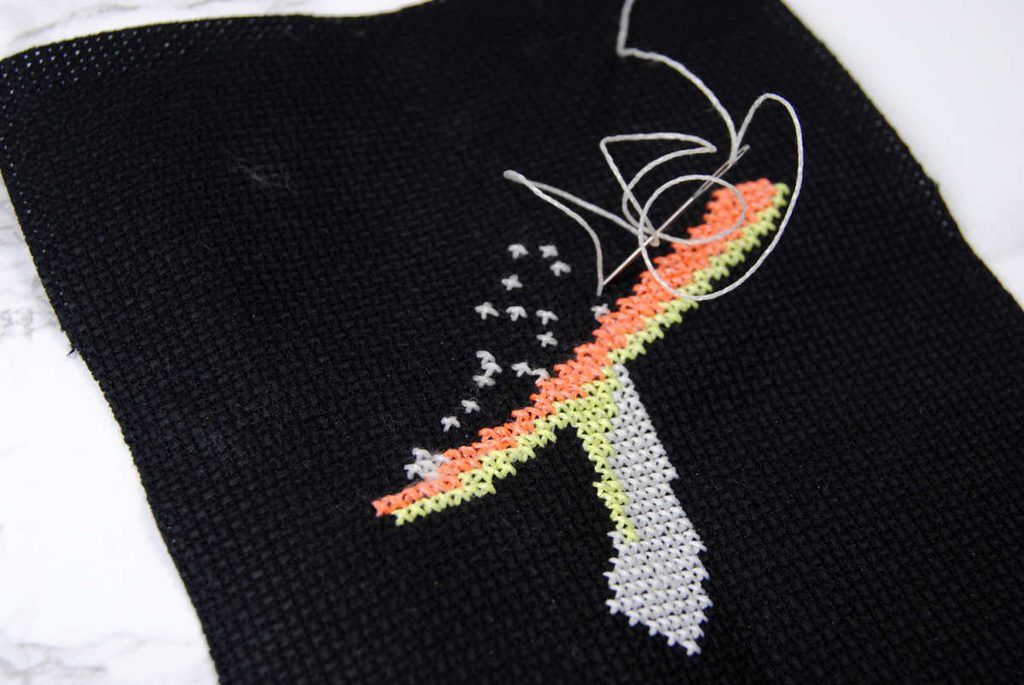 Demonstration of stitching with white kreinik #8 glow in the dark thread. 