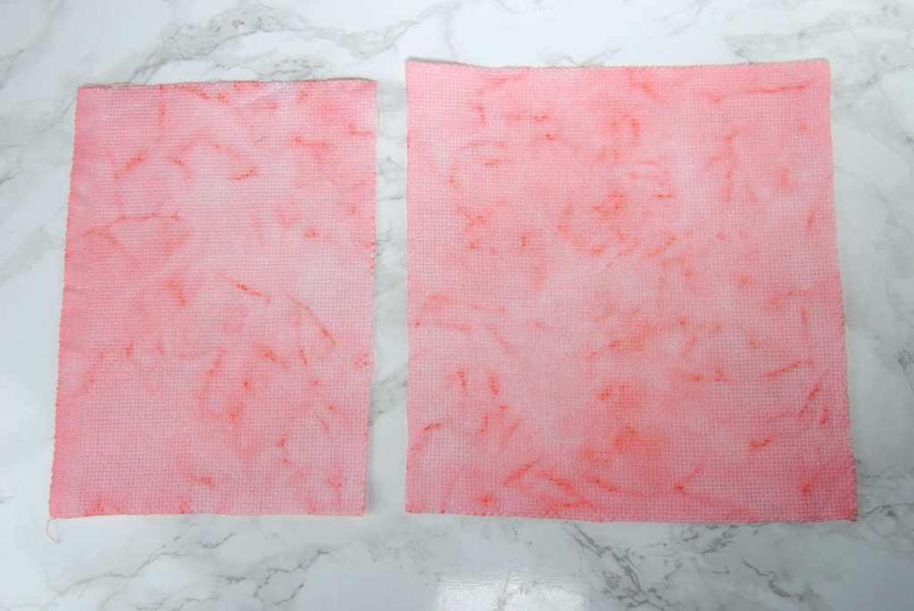 Kool-Aid stained aida fabric came out a lovely mottled pink