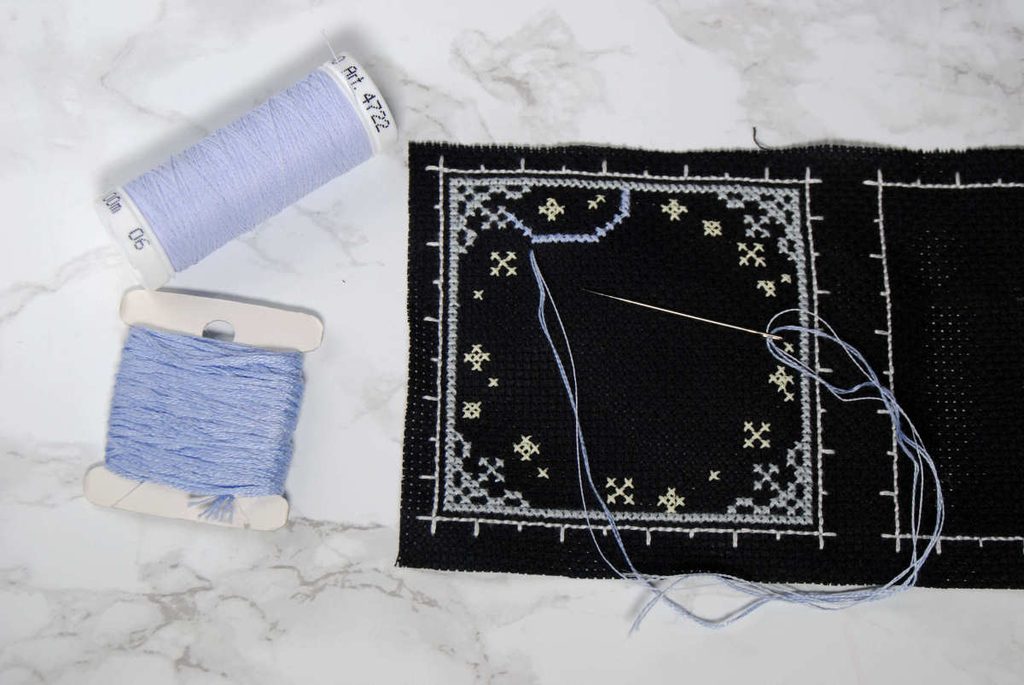 Example stitching with blended 2 strands of DMC and 1 of Sulky Glowy.