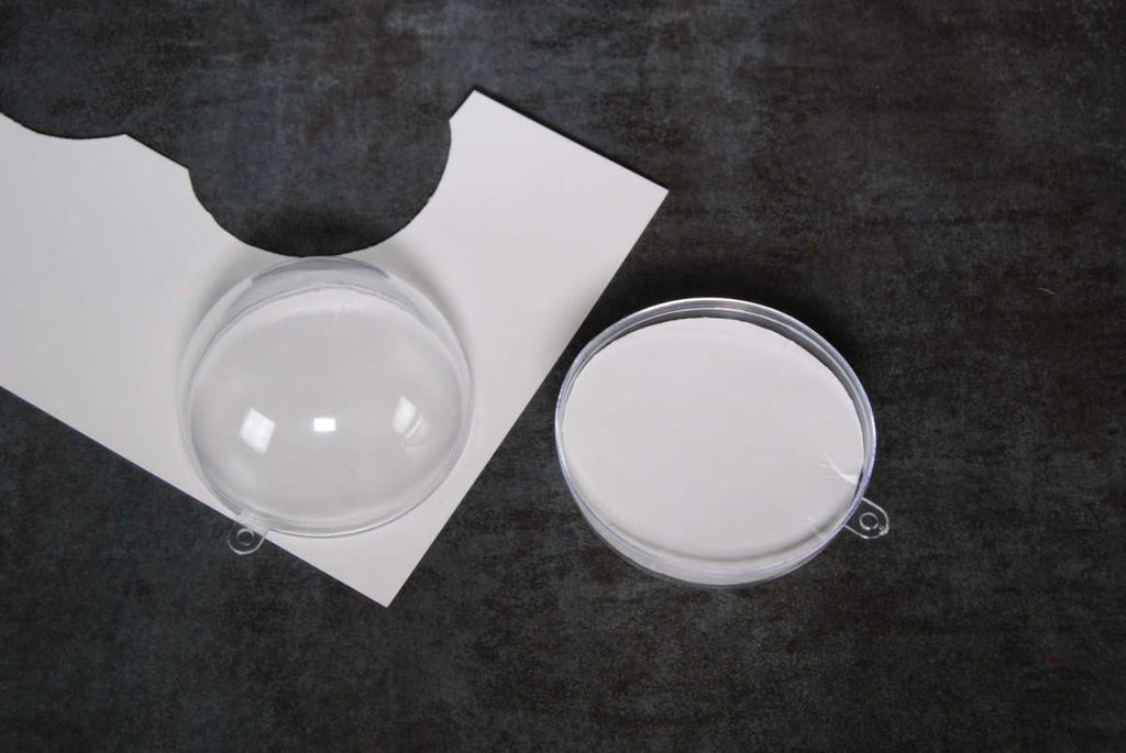 Demonstrating how to determine size of cardstock circle needed for your ornament