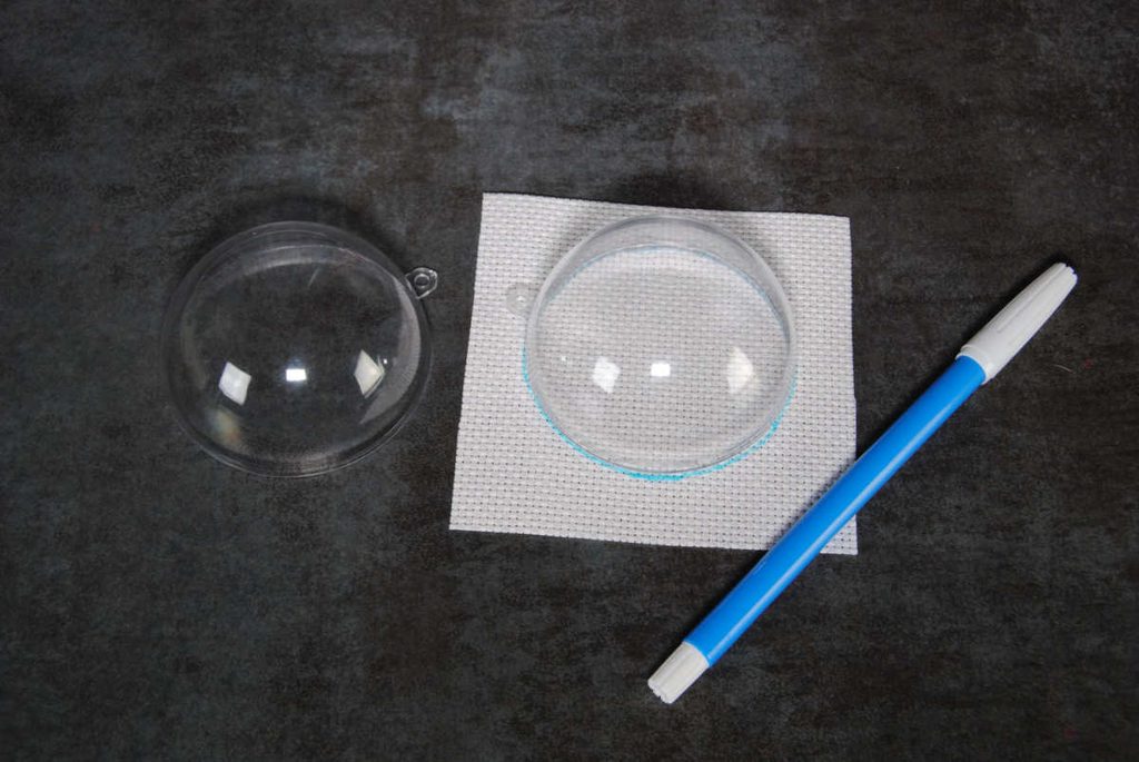 Determining the size of aida is needed for a snowglobe ornament