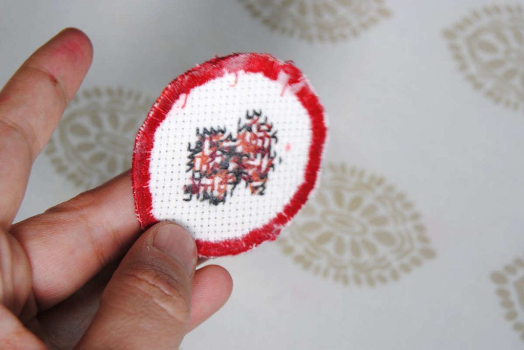 Back side of our completed cross stitch iron-on patch