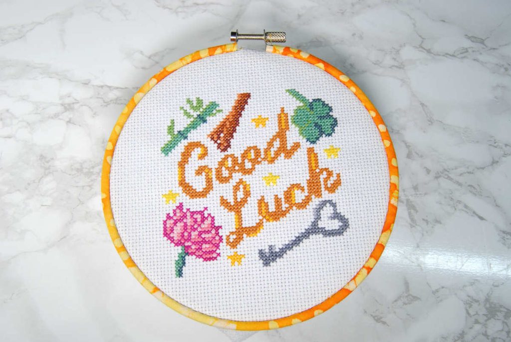 Front view of a fabric wrapped embroidery hoop