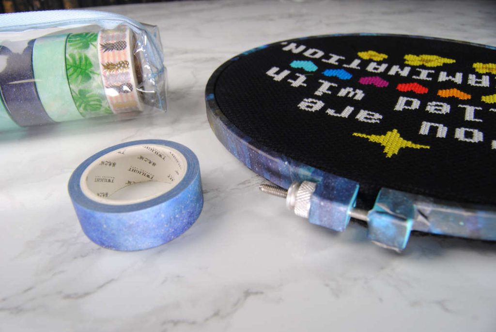 Side view example of washi tape around a plastic embroidery hoop