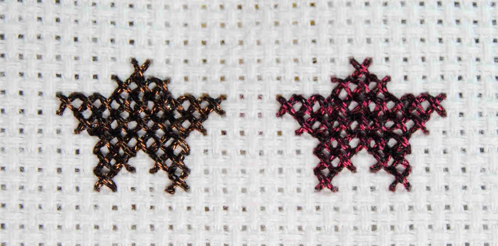 Comparison cross stitch. Two metallic stars showing the difference between normal stitching and this technique