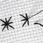 Stitched example of an algerian eyelet in progress.