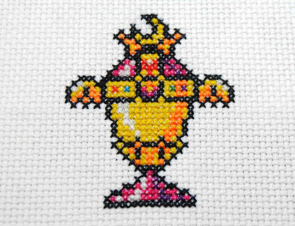 The Sailor Moon Holy Grail stitched in Mouliné Étoile and stranded cotton threads