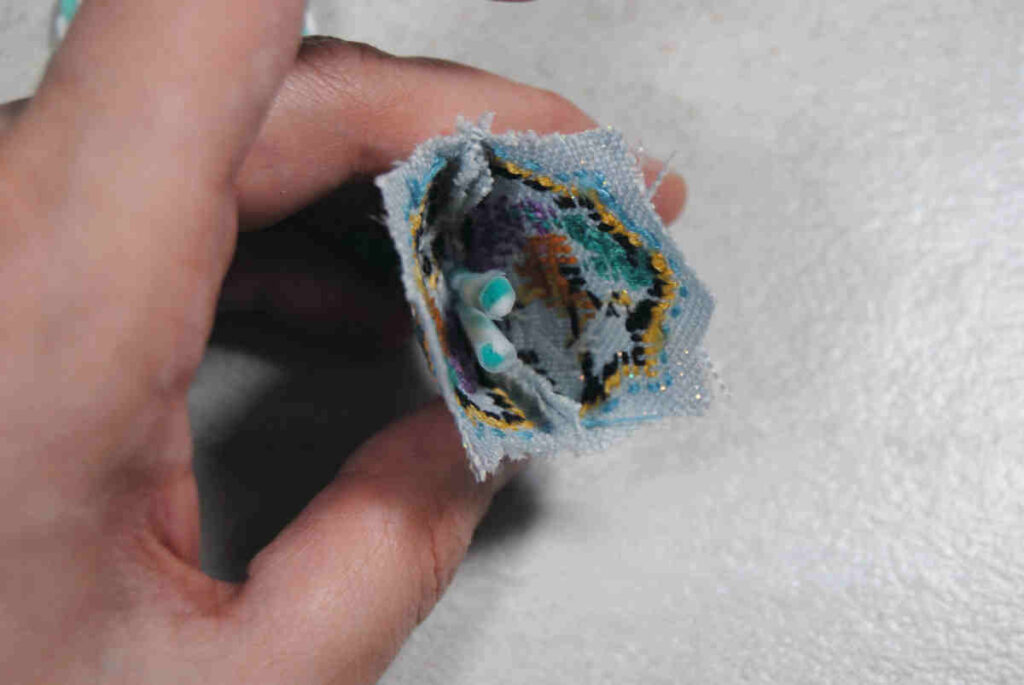 A look at the inside of a cross stitched scissor fob