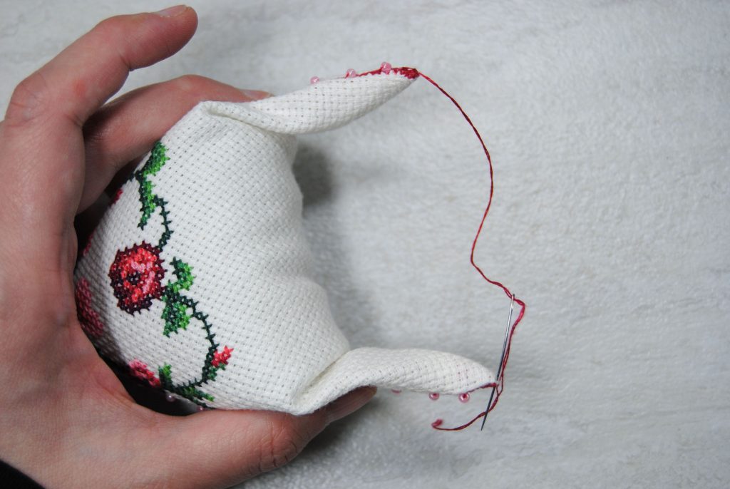 Stitching together the two tips of your triangle