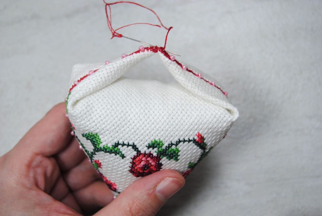 Stitching together the two tips of your triangle