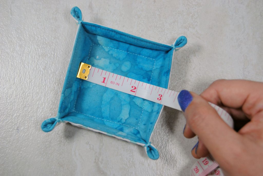 Measuring a preexisting fabric tray.